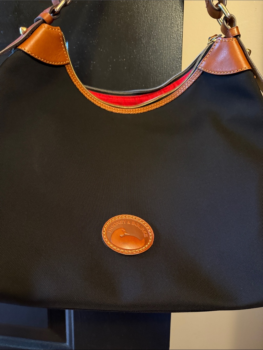 Dooney & Bourke Black Nylon Hobo with Tan Leather Trim and Red Lining